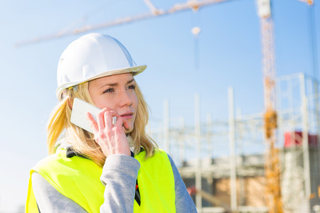 View of an attractive woman worker on a construction siteの写真素材
