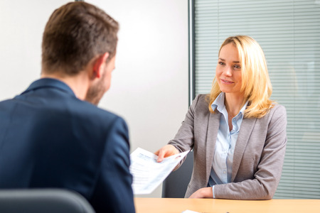 View of a Young attractive woman during job interviewの写真素材