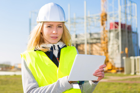 View of an attractive woman worker on a construction siteの写真素材