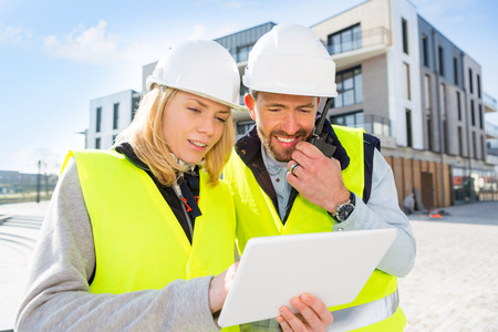 View of a Worker and enginner checking last details before deliveryの写真素材