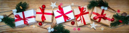 Christmas wooden background view with tree,gift and decorationの写真素材