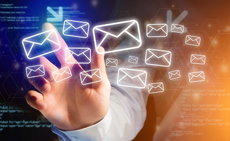 Concept view of sending message with technology interface with email icon aroundの写真素材
