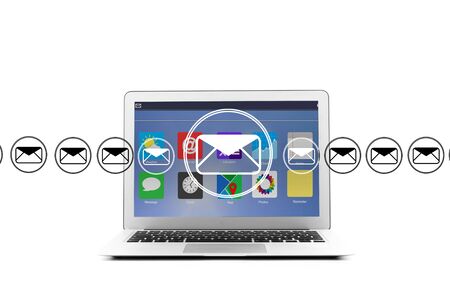 View of Email icons going out a computerの写真素材
