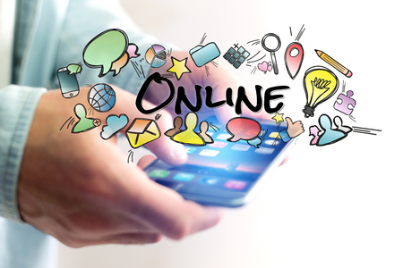 Concept of man holding smartphone with online title and multimedia icons flying around