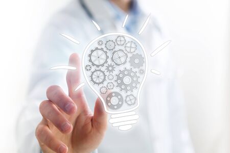 Concept view of setting a technology interface with cogwheel - Gear wheel conceptの写真素材