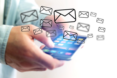 Concept view of sending email on smartphone interface with message icon aroundの写真素材
