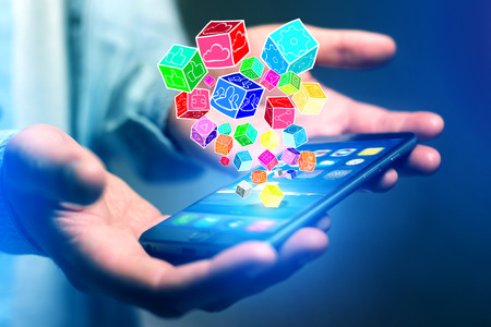 View of Colorfull application cube going out a smartphone - Technology conceptの写真素材