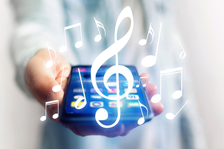 Concept view of listenning music on a device - Technology conceptの写真素材