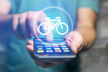 View of a Bicycle icon over device - Sport and technology conceptの写真素材