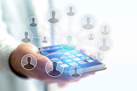 Concept view of professional network with contact icon over smartphone