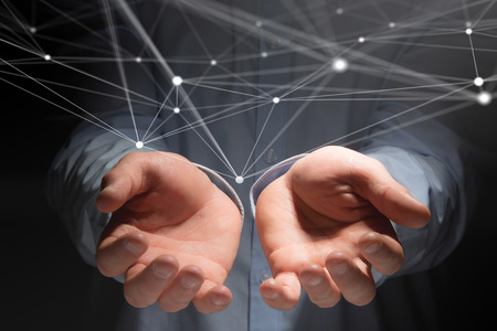 View of a Hand touchnig an operating system screen and network connection の写真素材