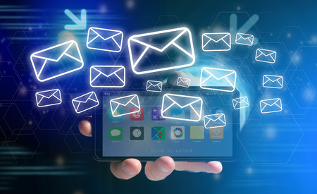 View of a Concept of sending message with email icon around - Communication and technology conceptの写真素材