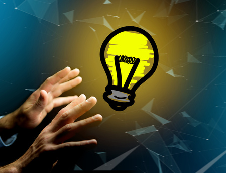 View of a Innovation bulb lamp turned on displayed on a futuristic interface  - technology and inspiration conceptの写真素材