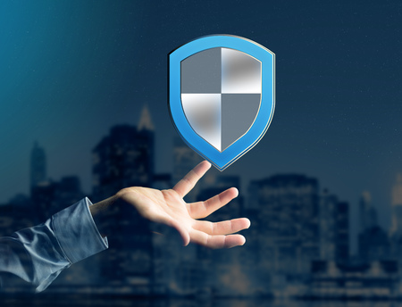 View of a Shield symbol displayed on a futuristic interface - Security and internet concept