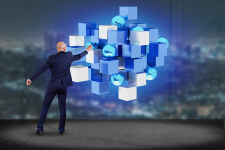 View of a 3d rendering blue and white cube on a futuristic interfaceの写真素材