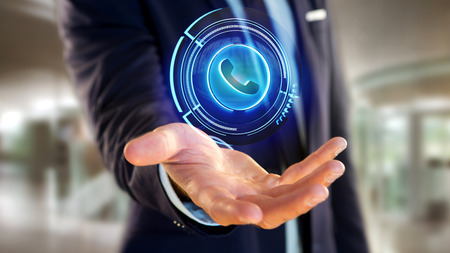 View of a Businessman holding a Shinny technologic phone button - 3d renderの写真素材