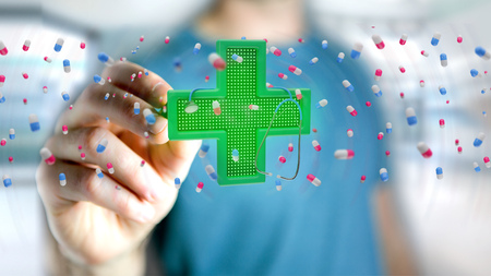 View of a Businessman holding a Lighting pharmacy cross and a stethoscope - 3d render の写真素材