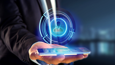 View of a Businessman using a smartphone with a Shinny technologic network contact button  - 3d renderの写真素材