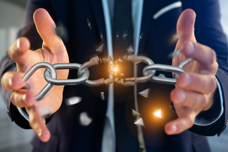 View of a Weak link of a Broken chain exploding - 3d renderの写真素材