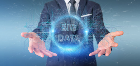 View of a Particles big data title holding by a businessmanの写真素材