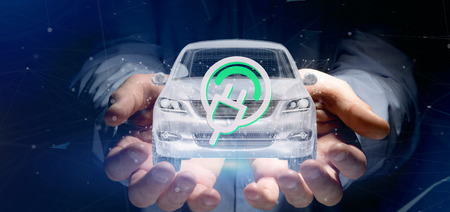 View of a Man holding an Electric smartcar concept  3d renderingの写真素材