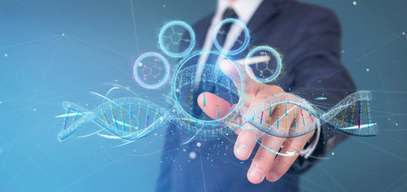 View of a Businessman holding a 3d render DNAの写真素材