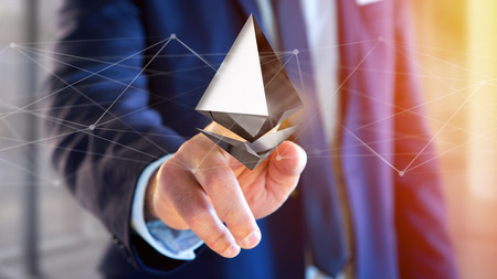 View of a Businessman holding a Ethereum crypto currency sign flying around a network connection -...