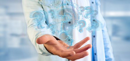 View of a Man holding a Question markの写真素材