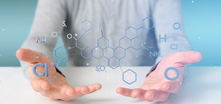 View of a Businessman holding a 3d rendering molecule structure isolated on a backgroundの写真素材