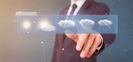 View of a businessman holding a weather forecast widget