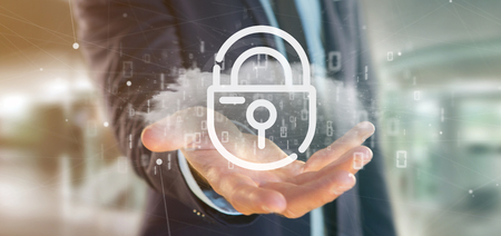 View of a Businessman holding a Binary cloud with internet security padlock 3d renderingの写真素材