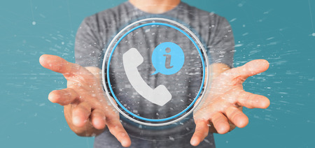 View of a Businessman holding a customer and assistance hotline service button 3d renderingの写真素材