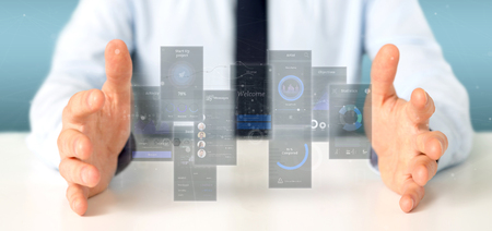 View of Businessman holding User interface screens with icon, stats and data 3d renderingの写真素材