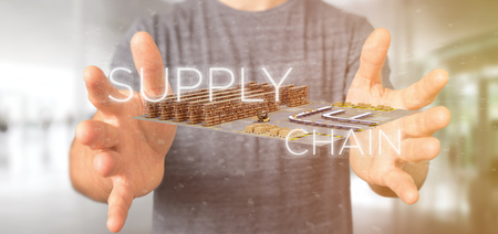 View of a Businessman holding a Supply Chain title with a warehouse on background 3d renderingの写真素材