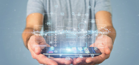 View of Businessman holding User interface screens with icon, stats and data 3d rendering