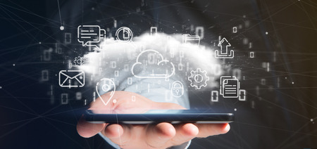 View of a Businessman holding a Cloud of multimedia icon 3d rendering