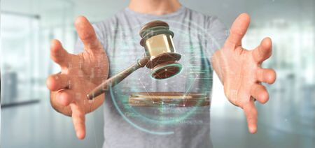 View of a Businessman holding a Justice hammer and data - 3d renderingの写真素材