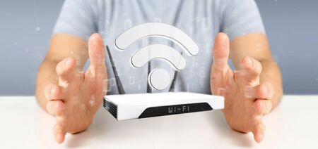 View of a Businessman holding a Wifi router and data - 3d renderingの写真素材