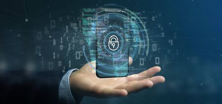 View of a Businessman holding Security data and smartphone security - 3d renderingの写真素材