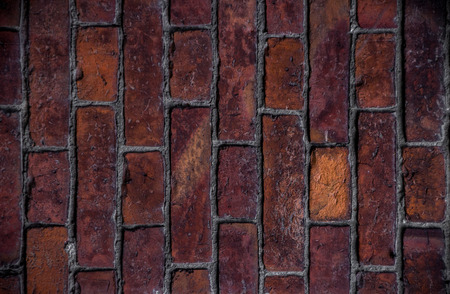 old wall of red bricks for texture, or backgroundの写真素材