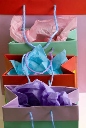 Colorful shopping bags full of presents for the holidays.の写真素材