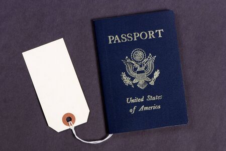 A USA passport with a sales tag on it... but how much?の写真素材