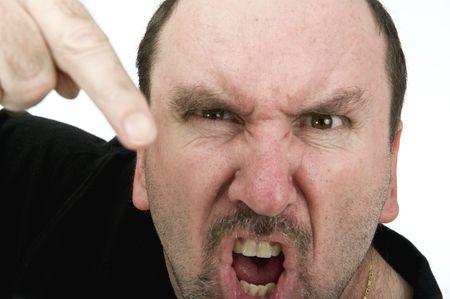 A middle age man yelling and pointing during an argurment.  Anger Managment???の写真素材