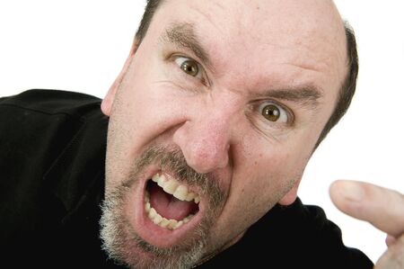 A middle age man yelling and pointing during an argurment.  Anger Managment???の写真素材