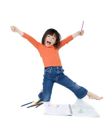 A young asian girl drawing a picture. On whiteの写真素材