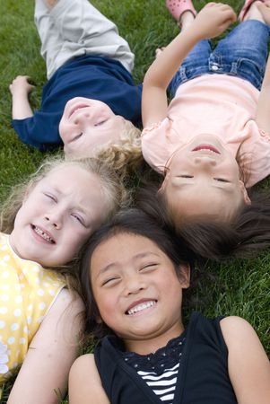 A group of diverse young kids playingの写真素材