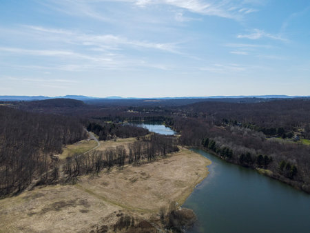 Aerial view of the beautiful lake and forest in spring time. Drone photographyの写真素材
