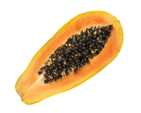 Ripe papaya fruit cut in half isolated on white background, top viewの写真素材