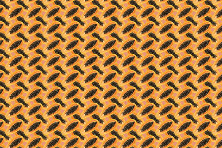 Abstract texture collage background composed of half papaya fruit in warm yellow-orange tones