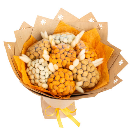 Creative bouquet composed of assorted flavored crispy coated peanuts wrapped in orange and brown craft paper, accented with dried white flowers. Perfect for gifts, celebrations, or culinary-themed presentations. Combines natural elements with elegant, warm tonesの写真素材